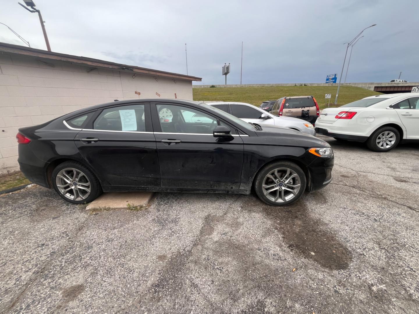 2020 BLACK Ford Fusion SEL (3FA6P0CD5LR) with an 1.5L L4 DOHC 16V engine, 6A transmission, located at 8101 E. Skelly Dr., Tulsa, OK, 74129, (918) 592-3593, 36.121891, -95.888802 - Photo#1